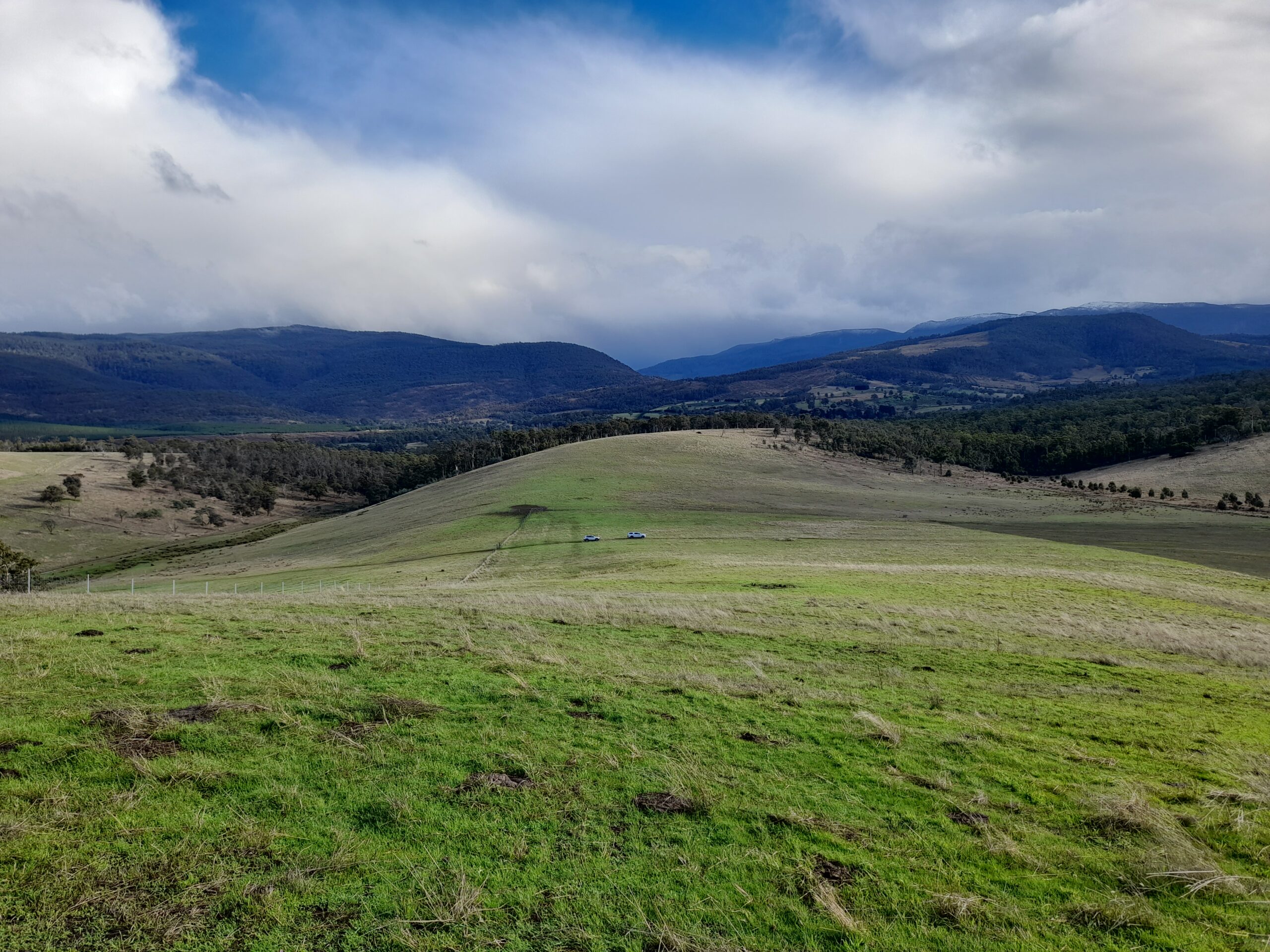 Landscape view of fields, hills and sky